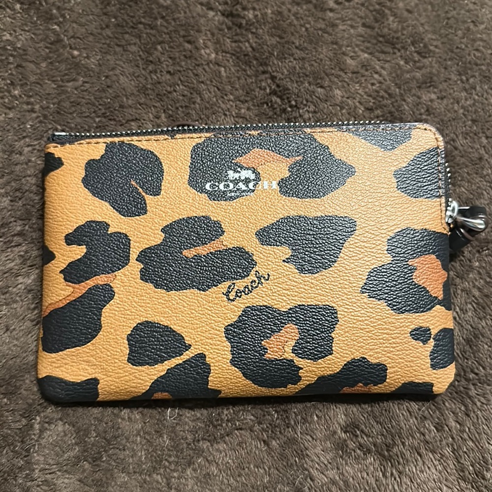 Leopard Coach wristlet- New with tags (not attached).